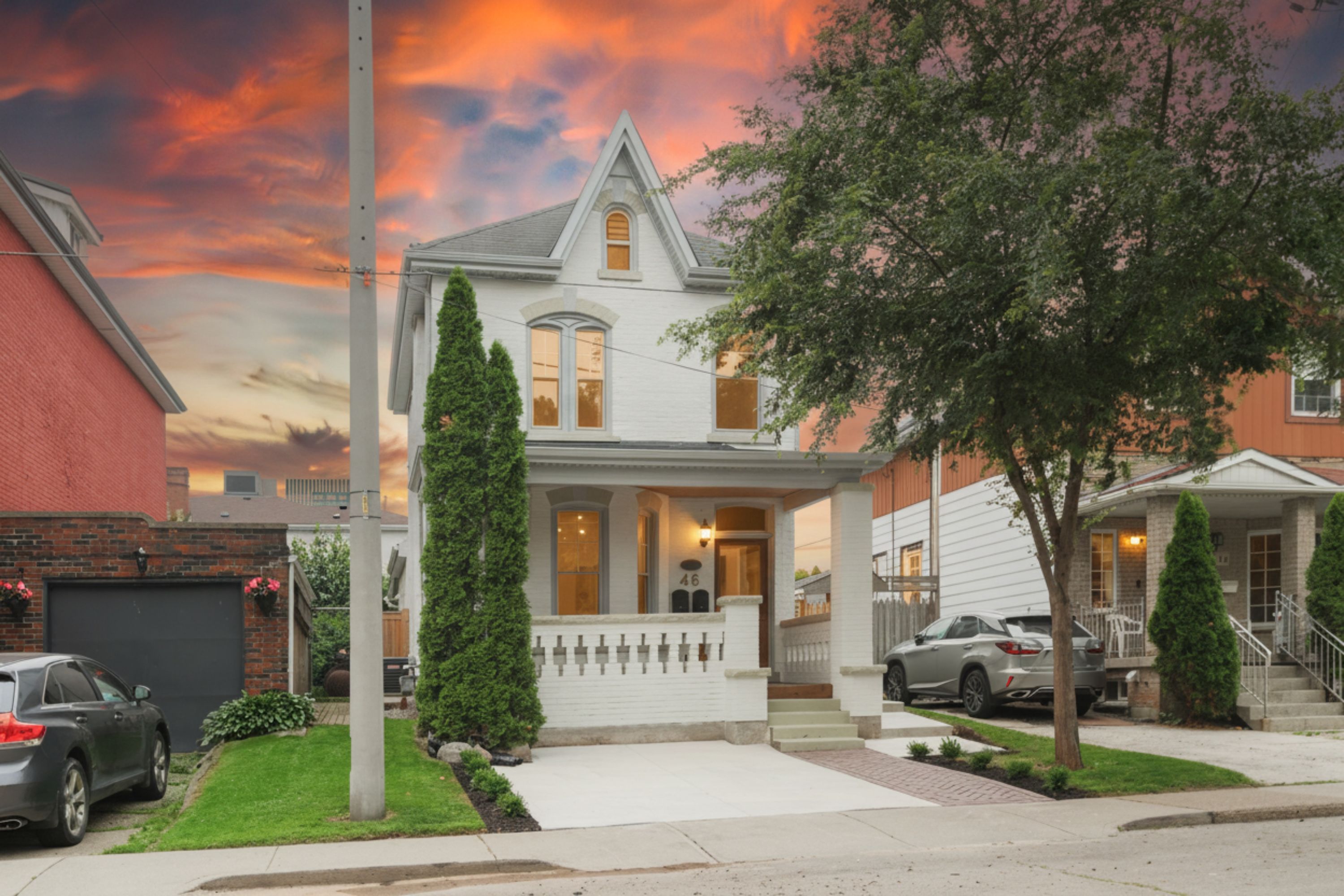 46 Murray St E — the same photo after one-click day-to-dusk conversion